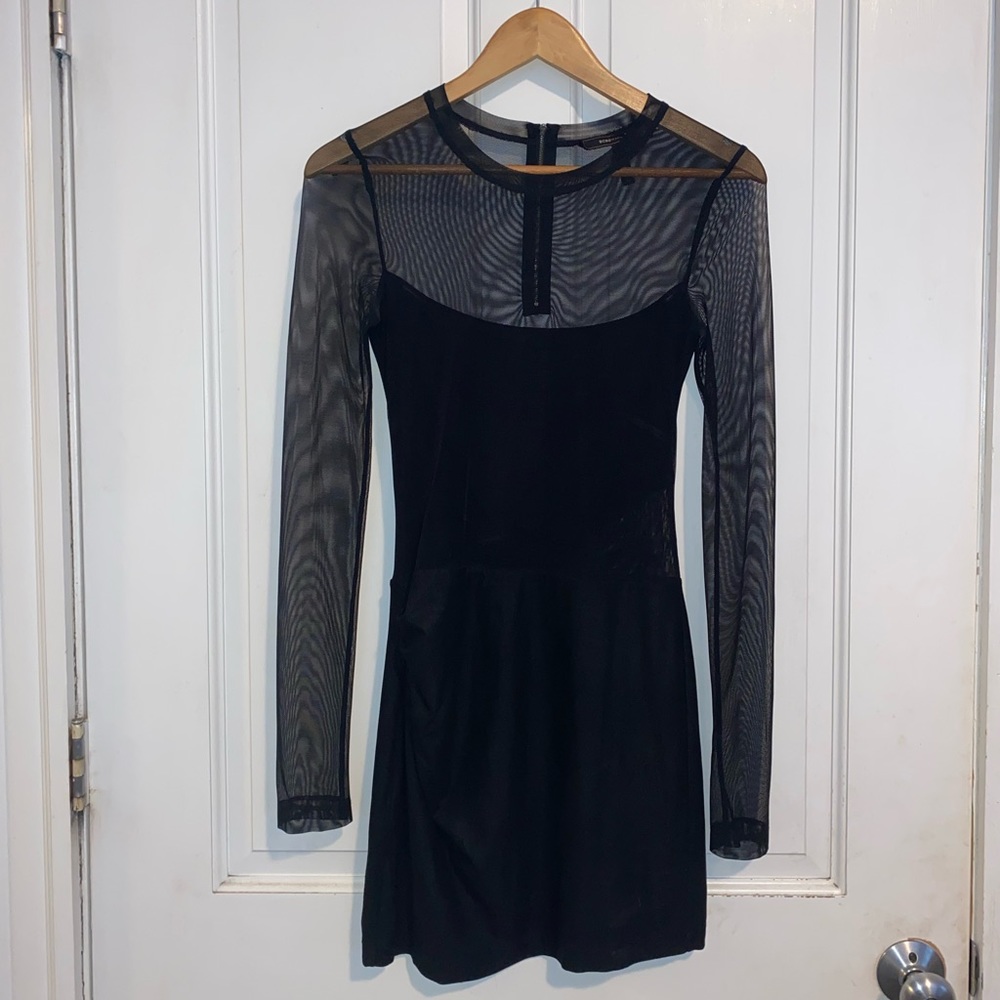 Black BCBGMAXAZRIA sheer sleeve and cut out minidress